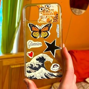 an Iphone 11 phone case and it is transparent with some cute summer stickers